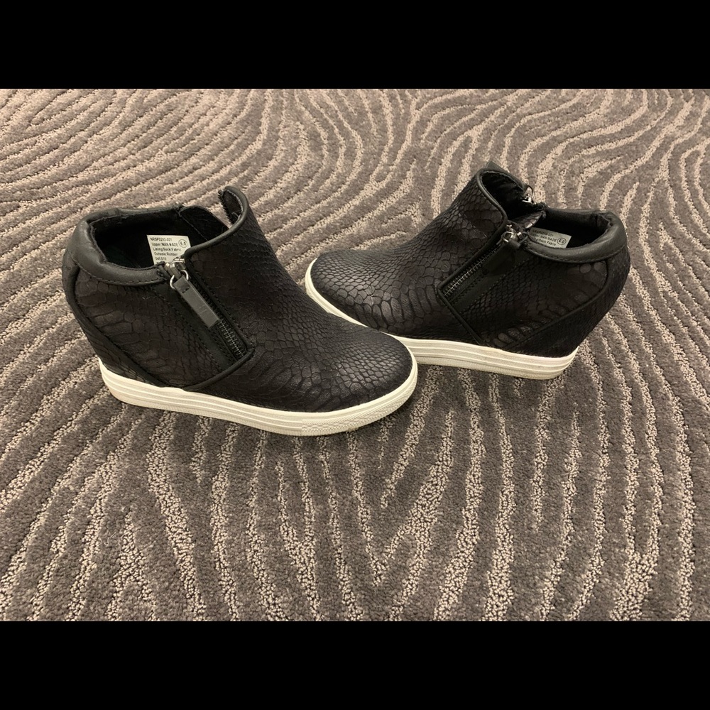 Women’s snakeskin wedges